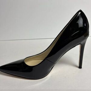 Black pointy patent leather heels. Only used once.